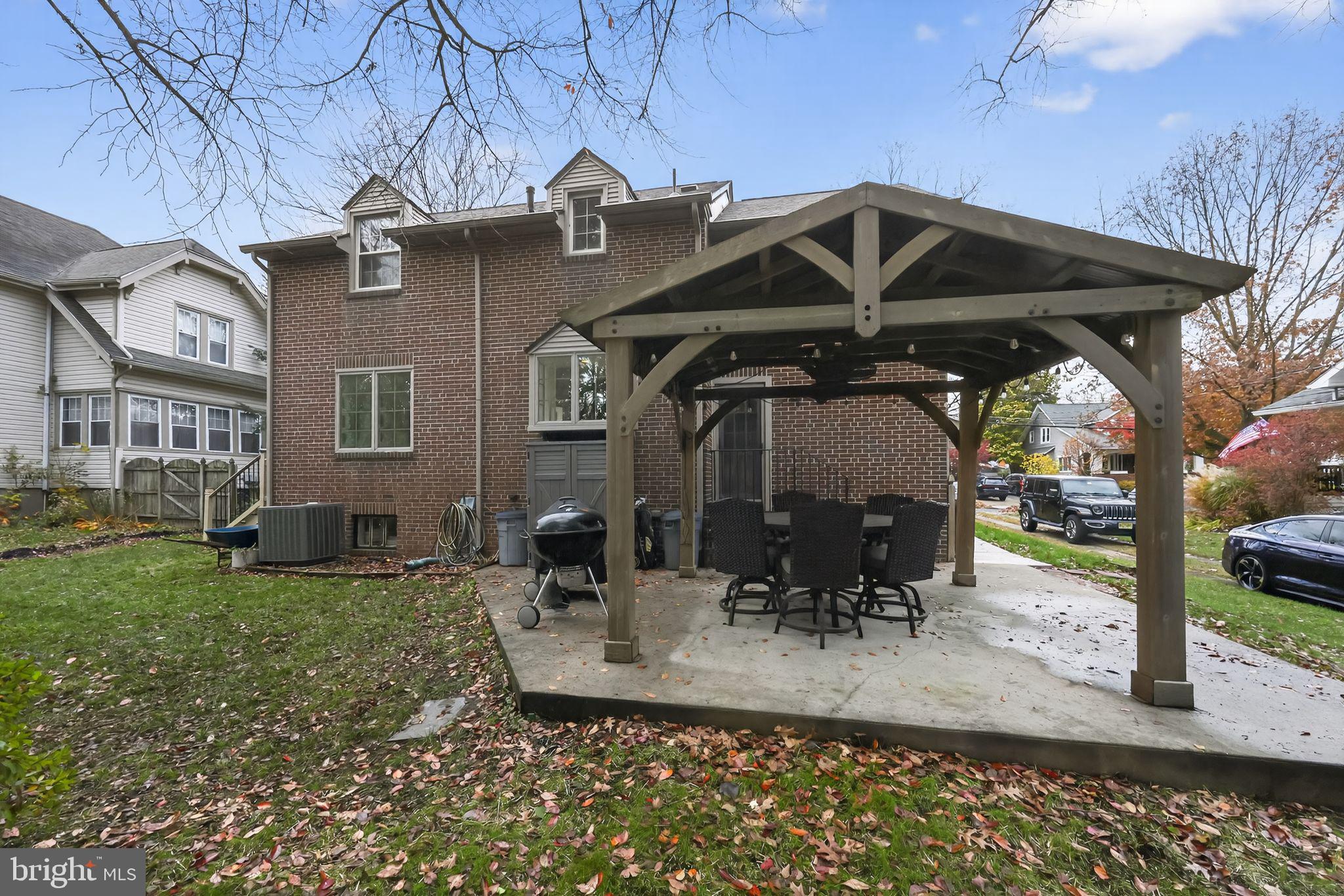 240 Hopkins Avenue Haddonfield, NJ 08033 - Photo 33 of 36 a view of a house with backyard and sitting area