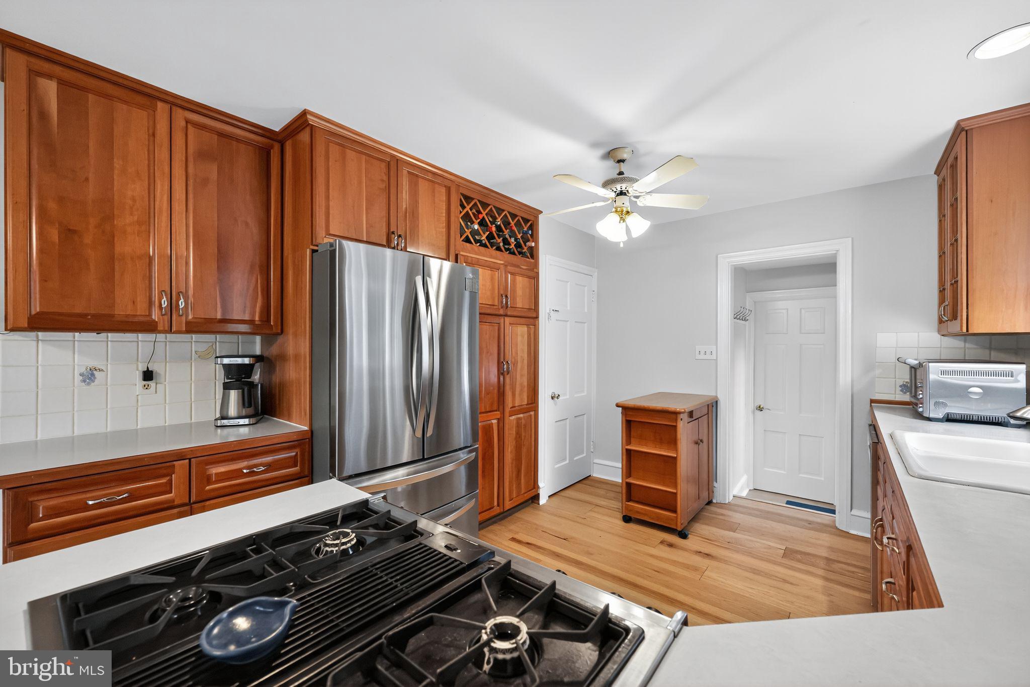 240 Hopkins Avenue Haddonfield, NJ 08033 - Photo 9 of 36 a living room with furniture and a fireplace
