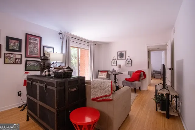 a en suite bathroom with a granite countertop toilet sink and shower
