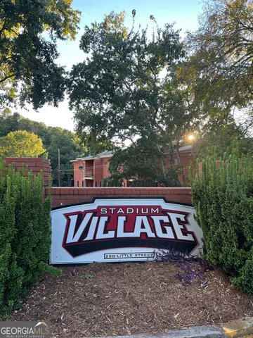 a view of a chairs and table in the patio