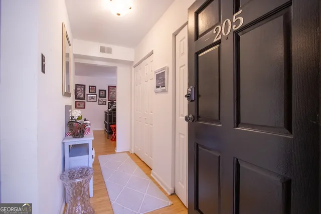 a kitchen with sink cabinets and appliances