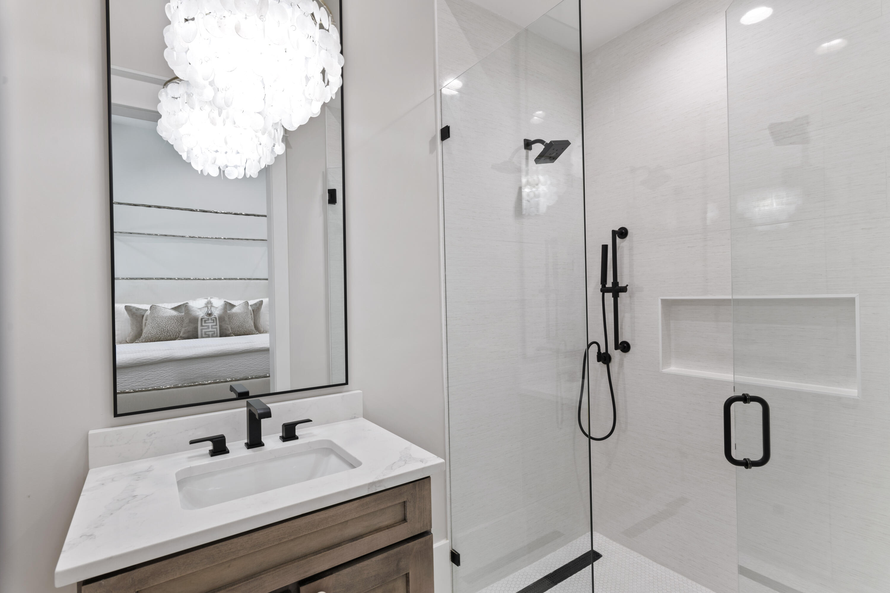 2924 Sand Pine Road Miramar Beach, FL 32550 - Photo 51 of 98 a bathroom with a sink vanity granite and a mirror