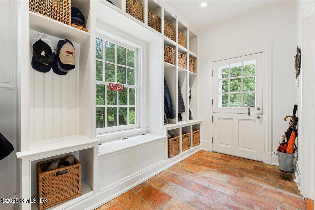 203 Riverside Avenue Riverside, CT 06878 - Photo 19 of 40 a view of an empty room with a window and storage