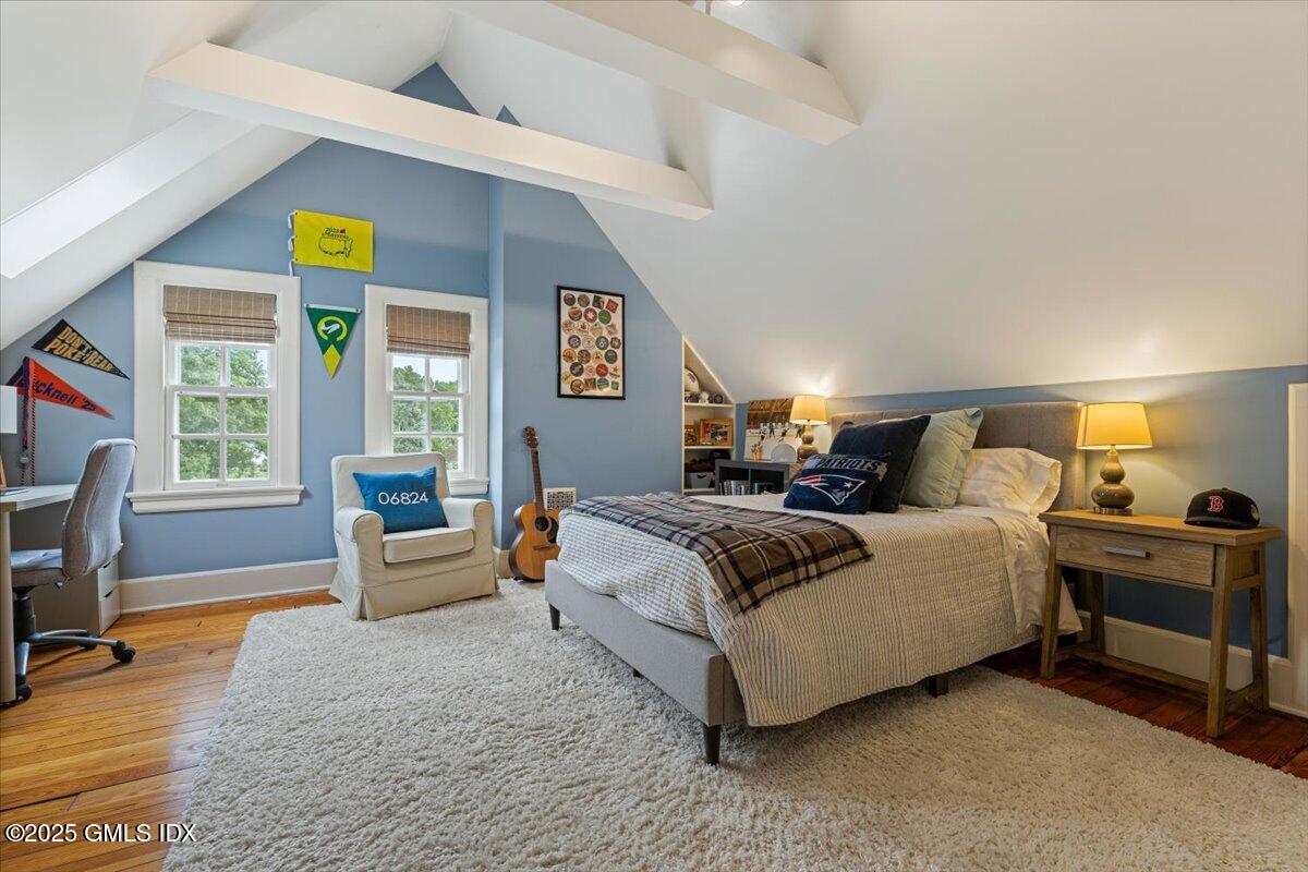 203 Riverside Avenue Riverside, CT 06878 - Photo 30 of 40 a bedroom with a bed and a couch