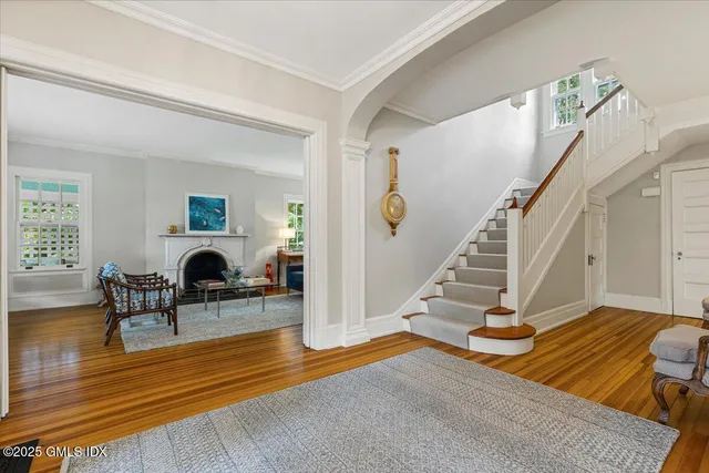 a living room with furniture and a table