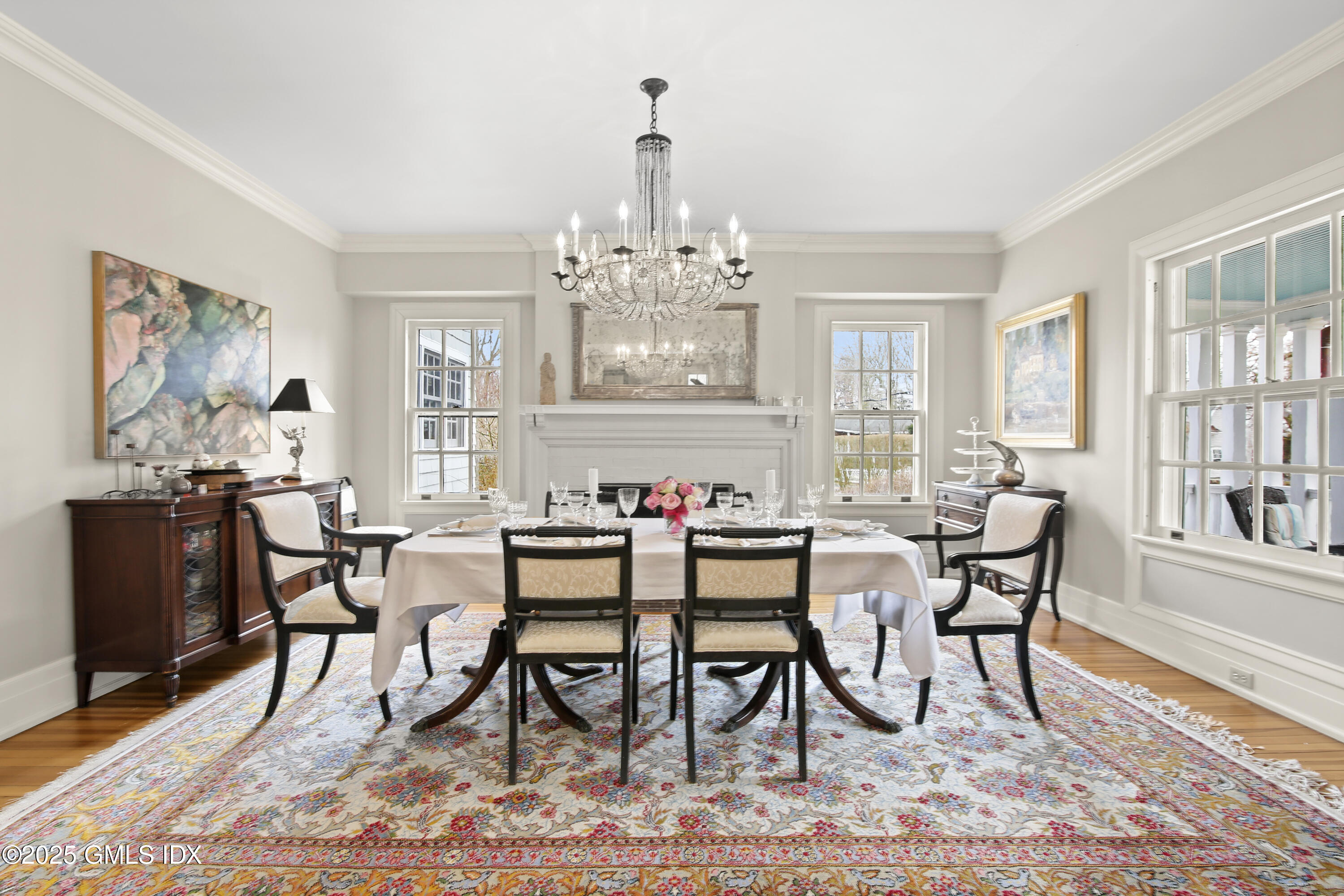 203 Riverside Avenue Riverside, CT 06878 - Photo 10 of 40 a view of a dining room with furniture a rug and wooden floor