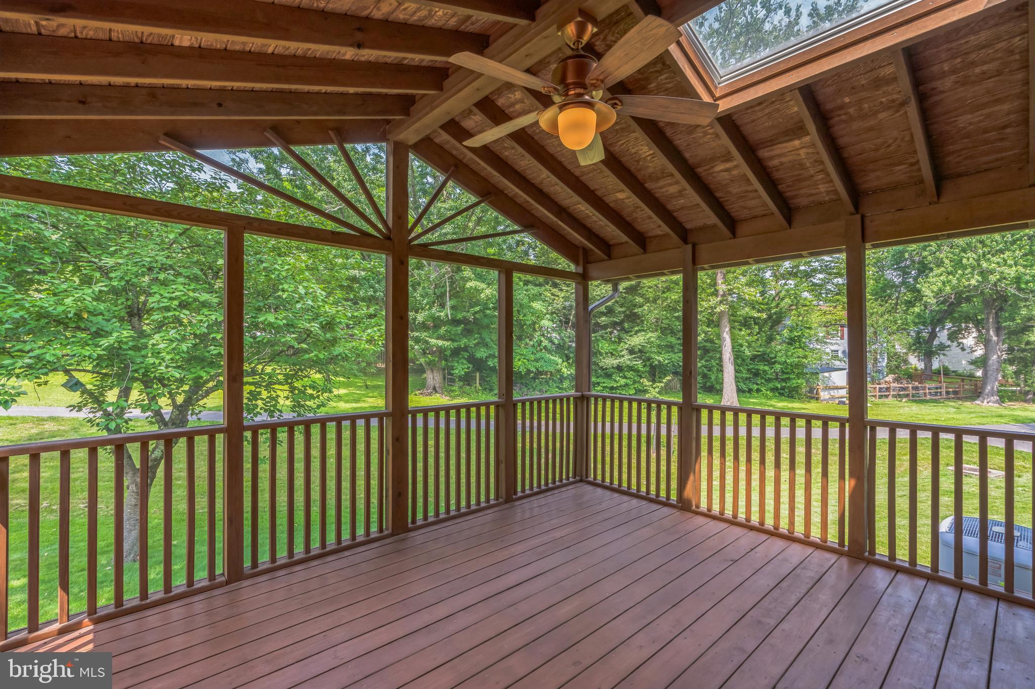 6411 Sunset Light Columbia, MD 21045 - Photo 11 of 37 a view of a wooden deck