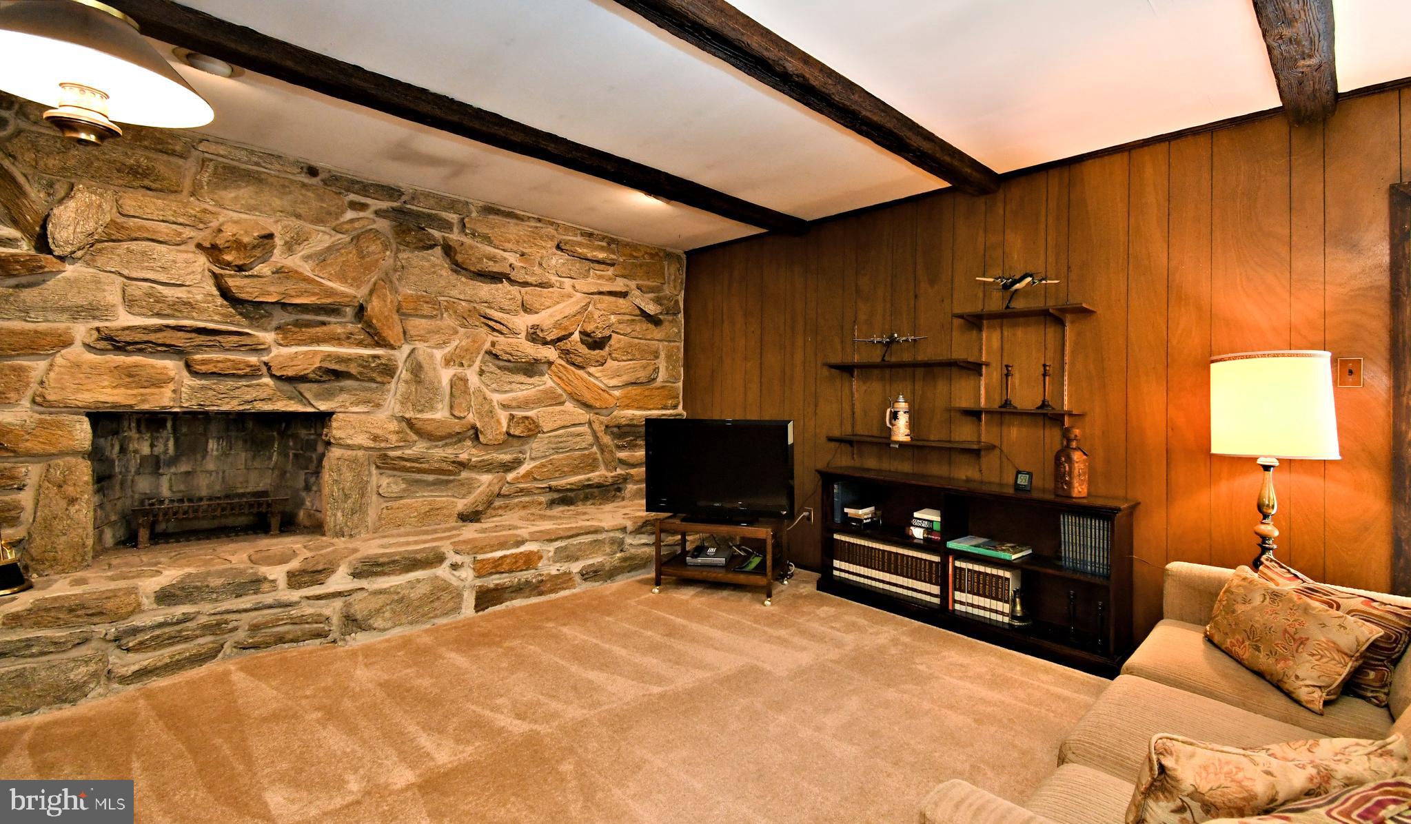 545 Brook Lane Warminster, PA 18974 - Photo 11 of 25 a view of a livingroom with furniture and a flat screen tv