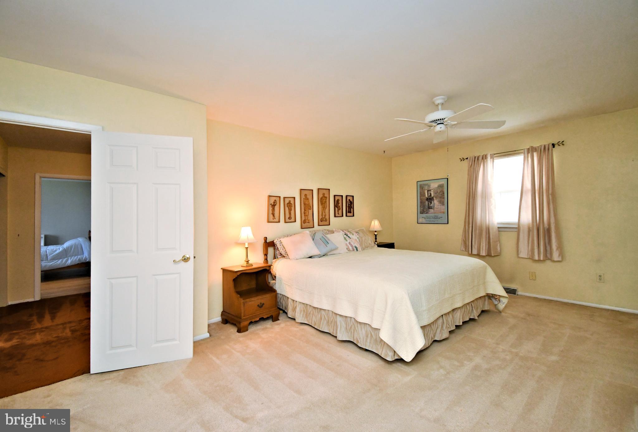 545 Brook Lane Warminster, PA 18974 - Photo 15 of 25 a bedroom with a bed and a large window