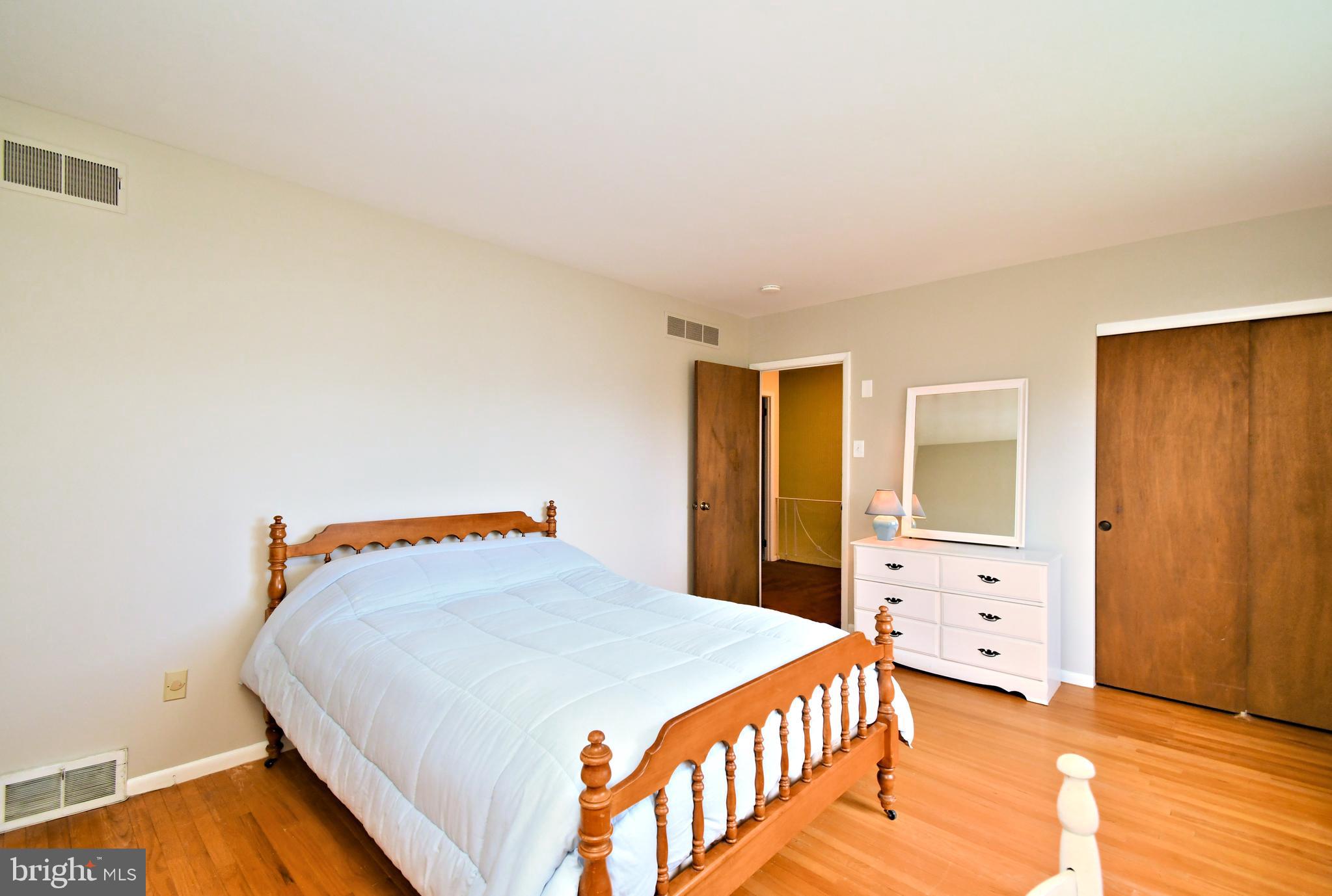 545 Brook Lane Warminster, PA 18974 - Photo 17 of 25 a bedroom with a bed and a closet