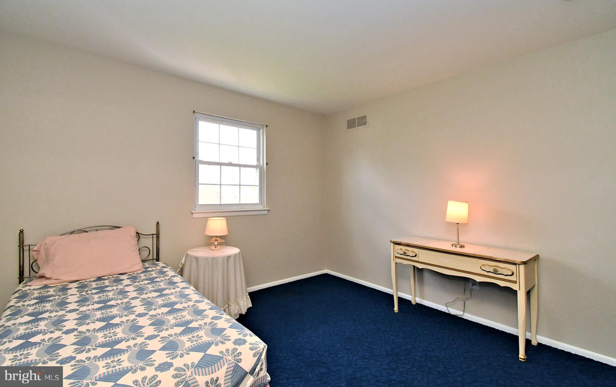 545 Brook Lane Warminster, PA 18974 - Photo 18 of 25 a bedroom with a bed and a window