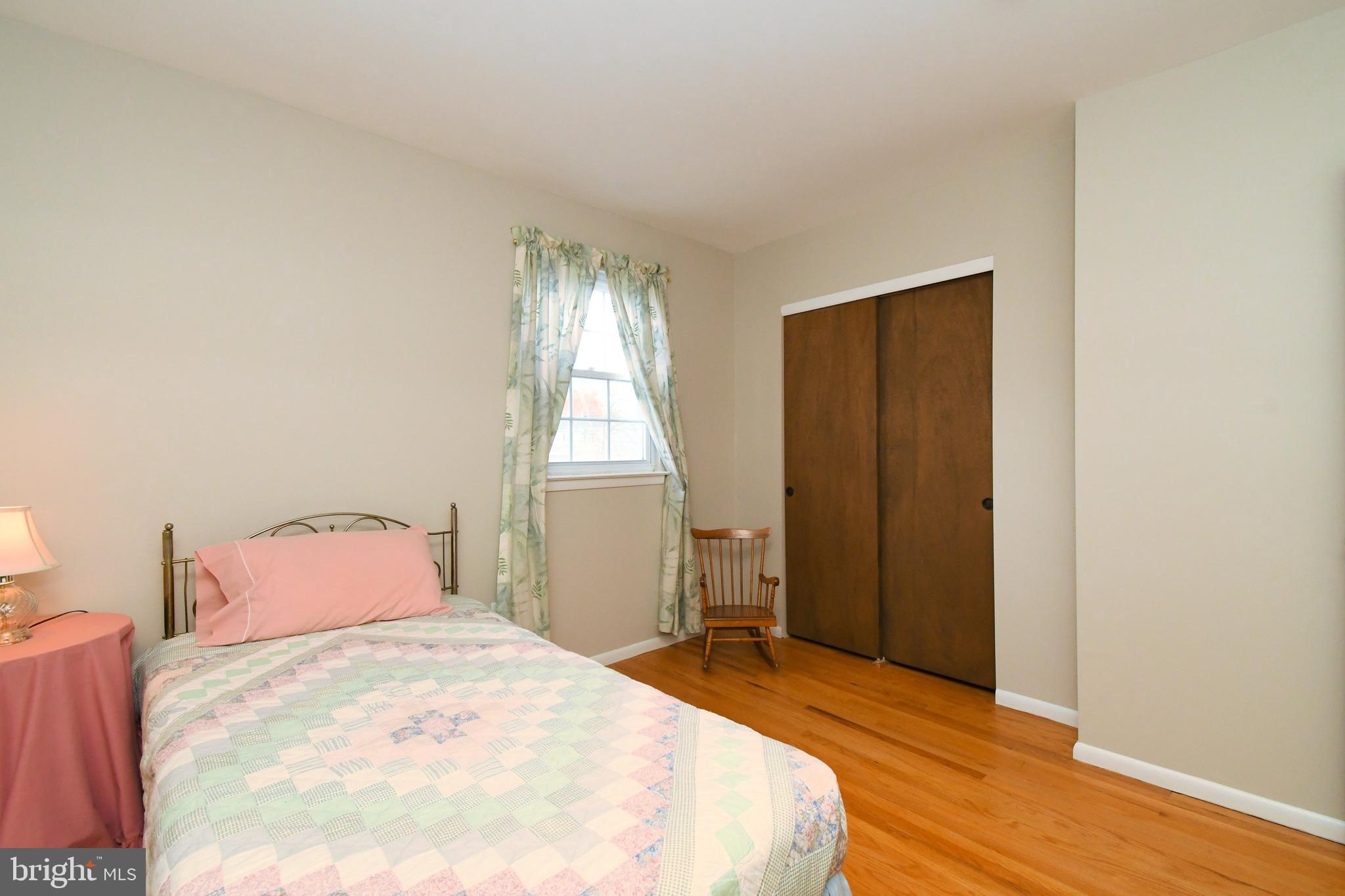 545 Brook Lane Warminster, PA 18974 - Photo 19 of 25 a bedroom with a bed and a window