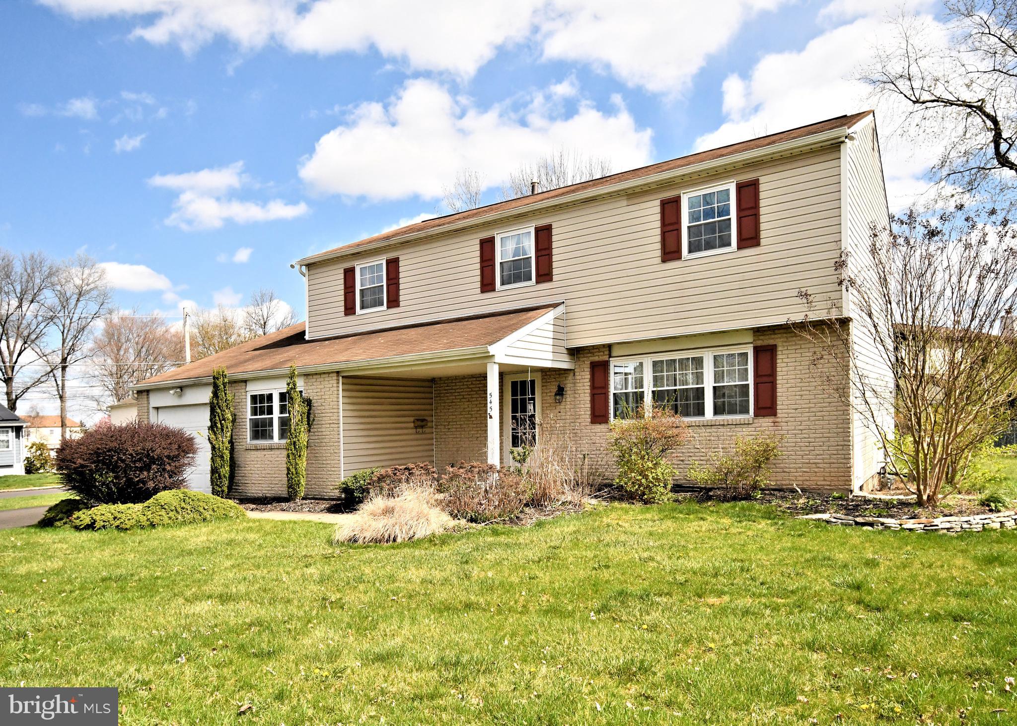 545 Brook Lane Warminster, PA 18974 - Photo 2 of 25 a front view of a house with a yard