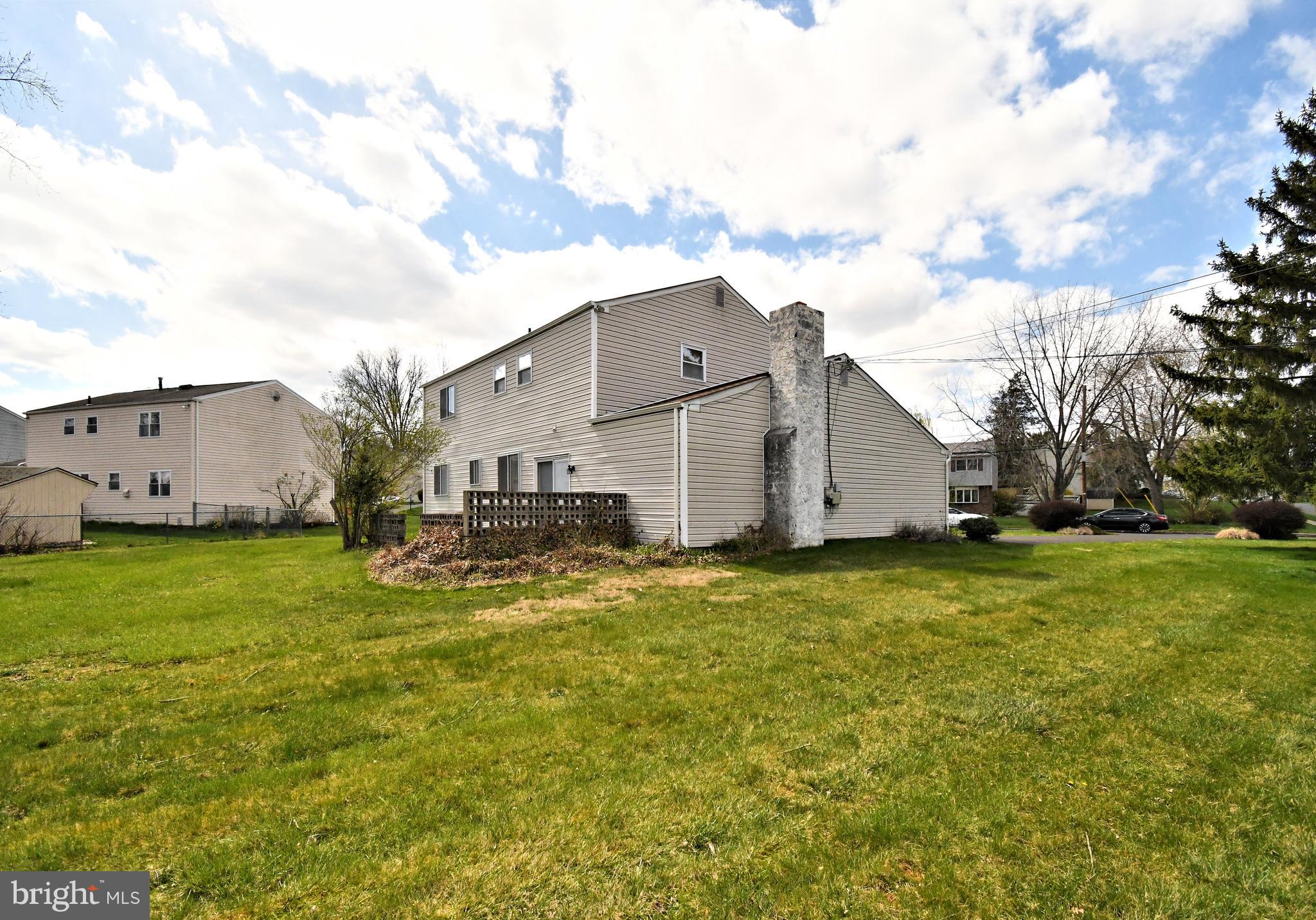 545 Brook Lane Warminster, PA 18974 - Photo 25 of 25 a view of a house with a back yard