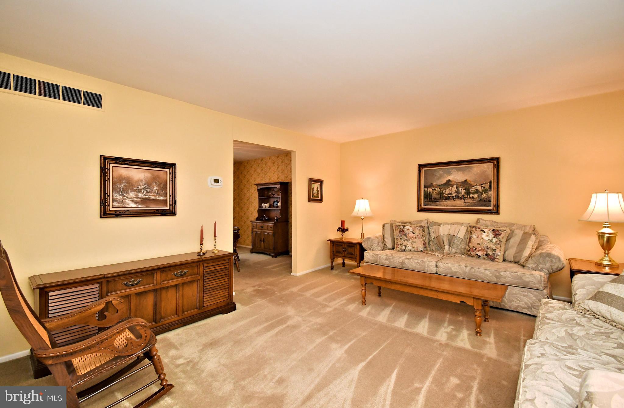 545 Brook Lane Warminster, PA 18974 - Photo 4 of 25 a living room with furniture and a flat screen tv
