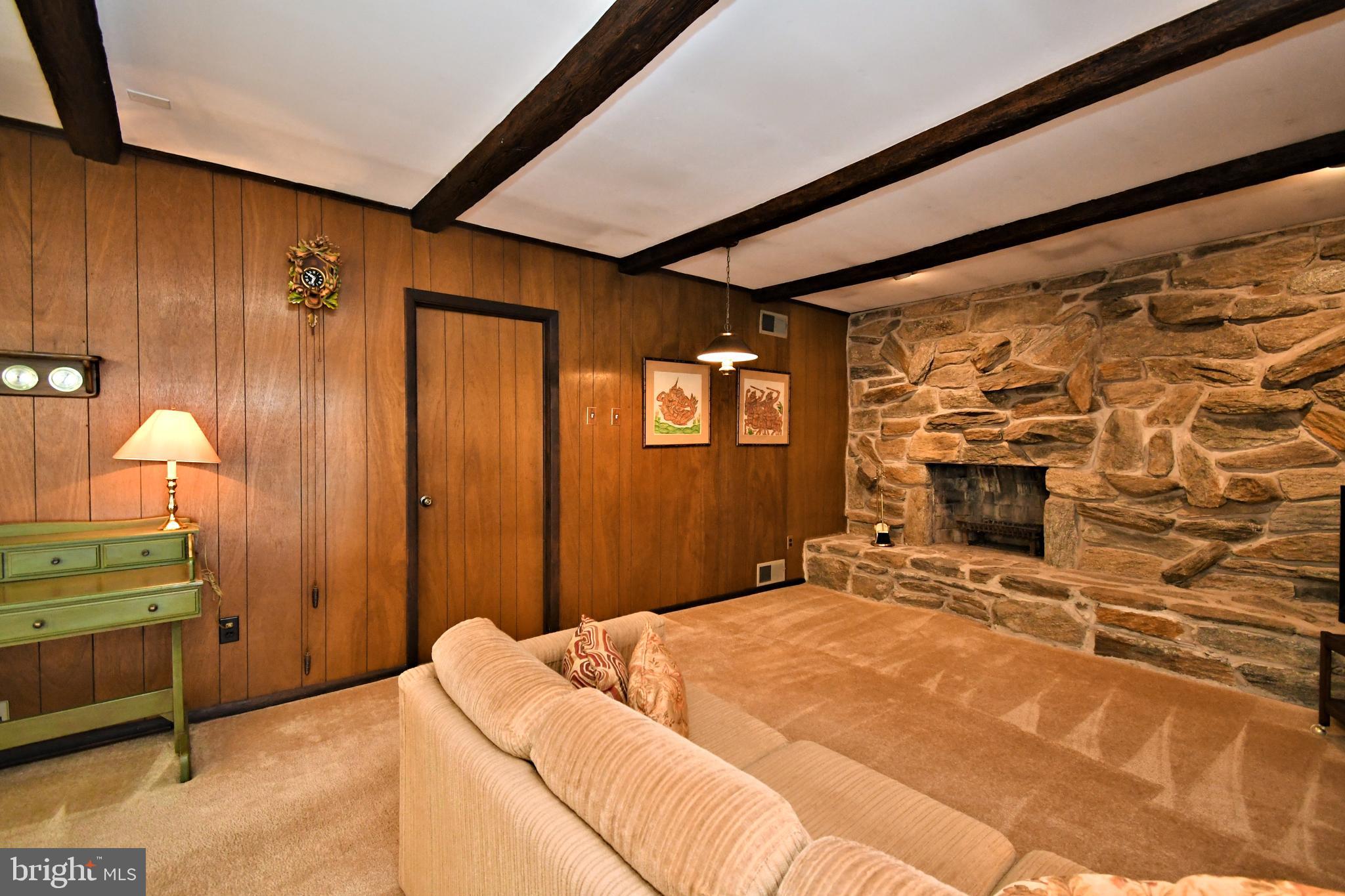 545 Brook Lane Warminster, PA 18974 - Photo 10 of 25 a bedroom with a bed and a fireplace