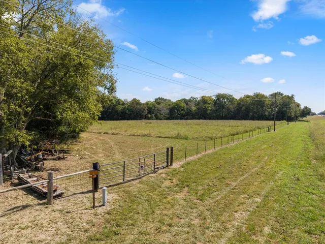 a view of lake with mountain in the background