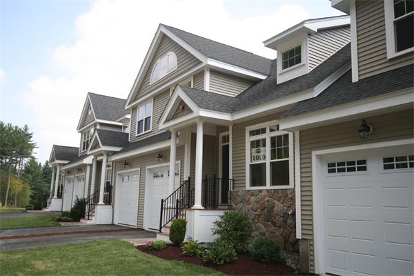 11 C Trail Ridge Way, Unit 35 Harvard, MA 01451 - Photo 1 of 30 a front view of a house with a yard