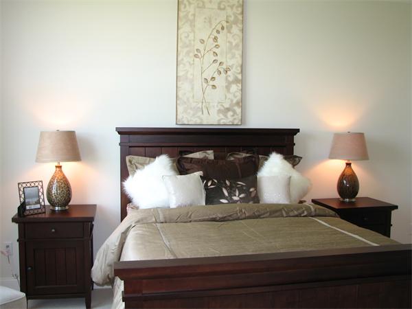 11 C Trail Ridge Way, Unit 35 Harvard, MA 01451 - Photo 12 of 30 a bedroom with a bed and lamp