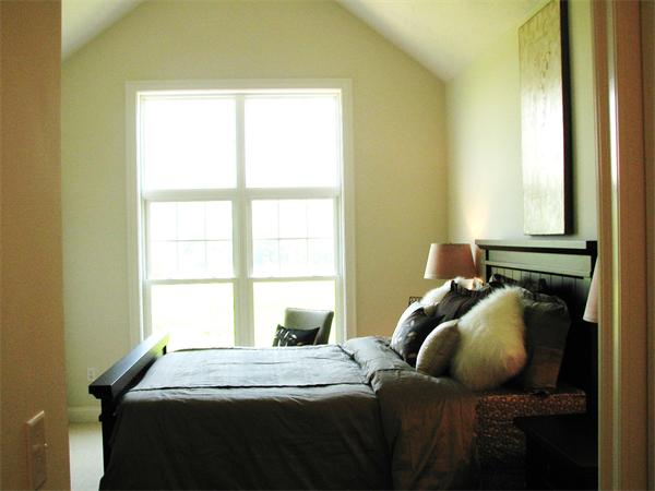 11 C Trail Ridge Way, Unit 35 Harvard, MA 01451 - Photo 13 of 30 a bedroom with a bed and a window