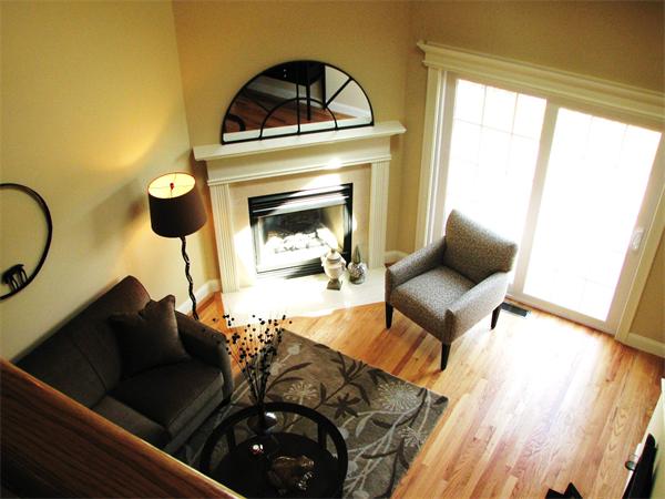 11 C Trail Ridge Way, Unit 35 Harvard, MA 01451 - Photo 18 of 30 a living room with furniture and a fireplace