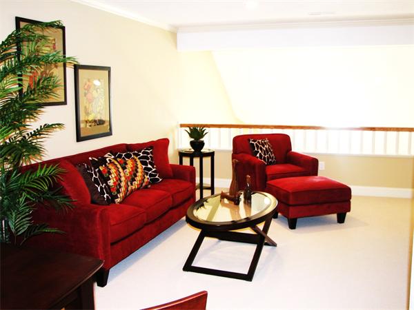 11 C Trail Ridge Way, Unit 35 Harvard, MA 01451 - Photo 20 of 30 a living room with furniture and a potted plant