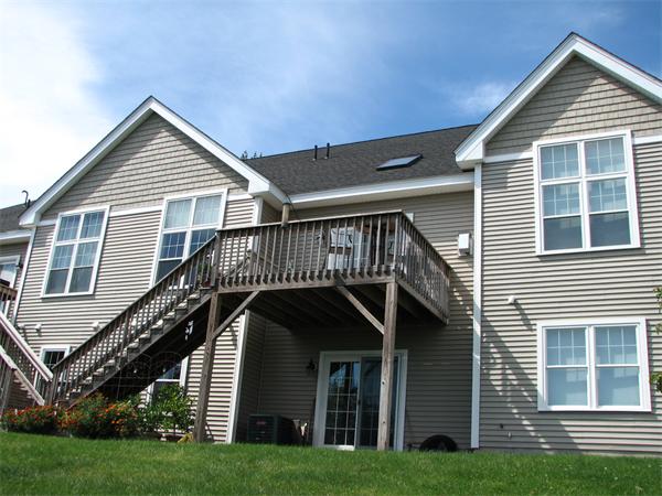 11 C Trail Ridge Way, Unit 35 Harvard, MA 01451 - Photo 2 of 30 a front view of a house with a yard