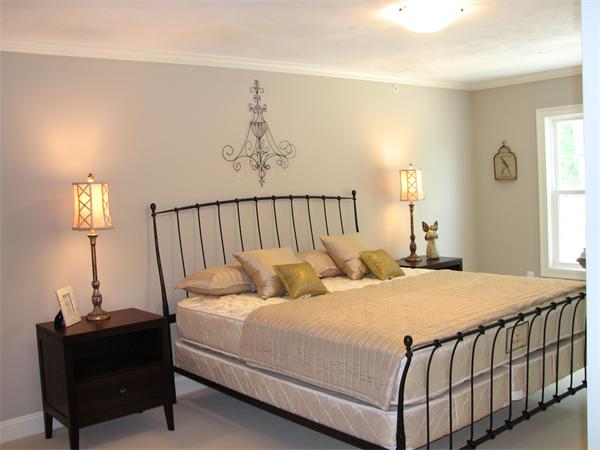 11 C Trail Ridge Way, Unit 35 Harvard, MA 01451 - Photo 22 of 30 a bedroom with a bed and a lamp on dresser
