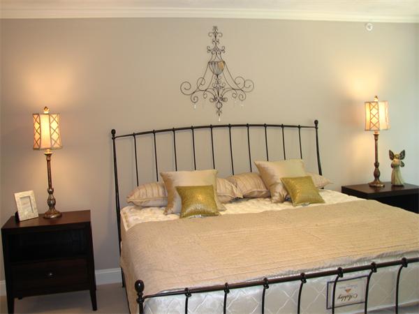 11 C Trail Ridge Way, Unit 35 Harvard, MA 01451 - Photo 25 of 30 a bedroom with a bed and a table
