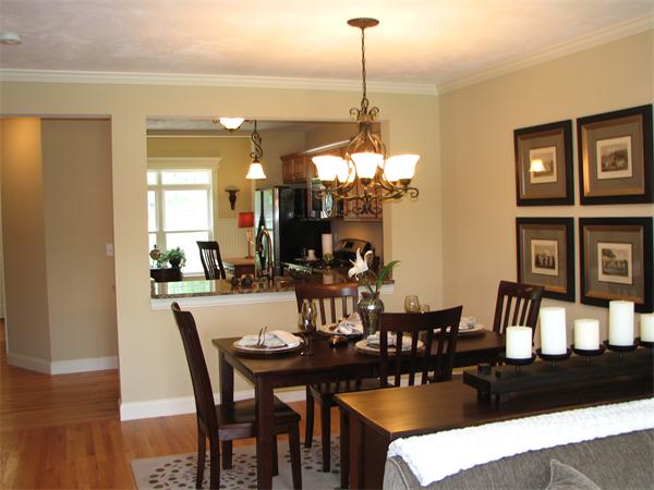 11 C Trail Ridge Way, Unit 35 Harvard, MA 01451 - Photo 8 of 30 a view of a dining room with furniture and wooden floor