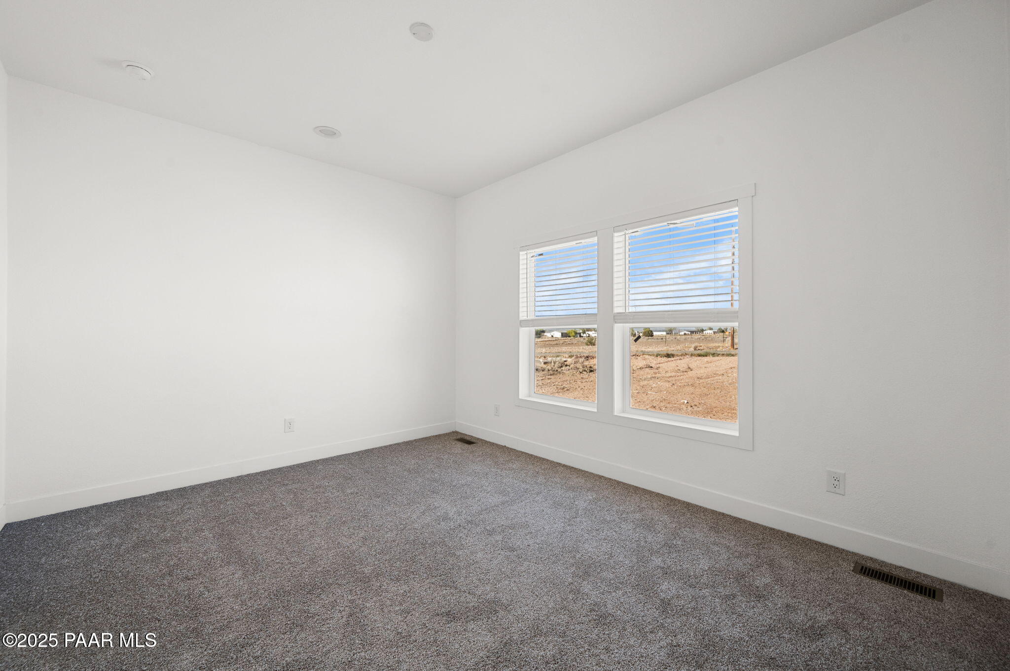 39 East Abra Road Paulden, AZ 86334 - Photo 12 of 23 an empty room with windows