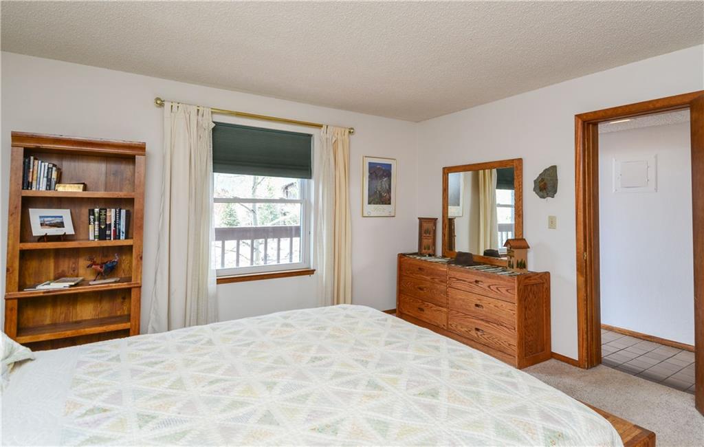 500 Bills Ranch Road, Unit 271 Frisco, CO 80443 - Photo 13 of 22 a bed room with a bed and a television