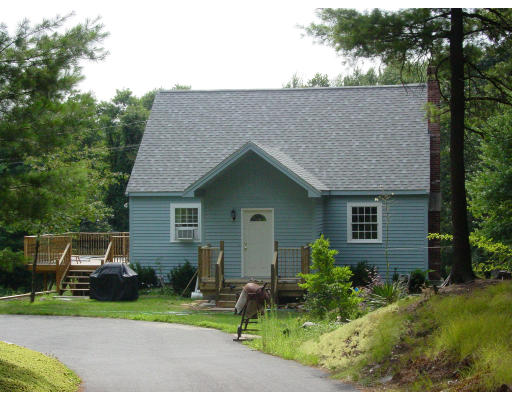 128 Haverhill Road Topsfield, MA 01983 - Photo 1 of 1 a house view with a garden space