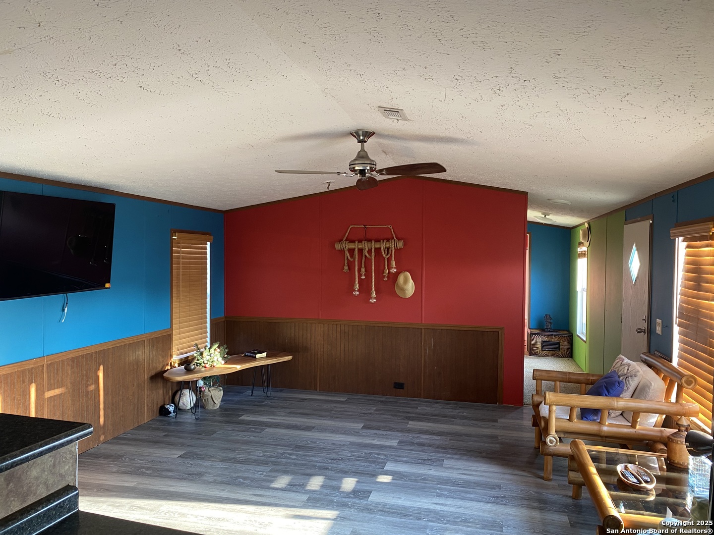 13014 Bernhardt Road San Antonio, TX 78263 - Photo 13 of 29 a view of a room with workspace and wooden floor