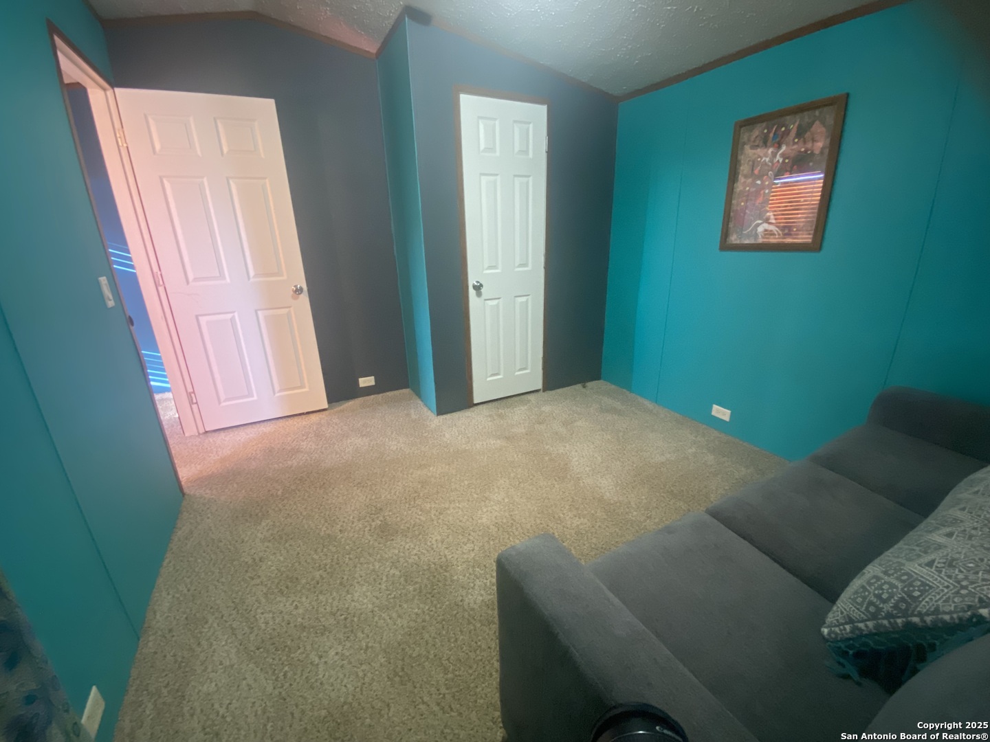 13014 Bernhardt Road San Antonio, TX 78263 - Photo 16 of 29 a view of a room with a furniture and a window