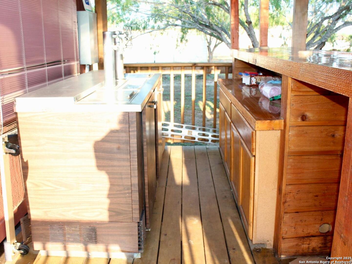 13014 Bernhardt Road San Antonio, TX 78263 - Photo 19 of 29 a balcony view with a large window and outdoor space