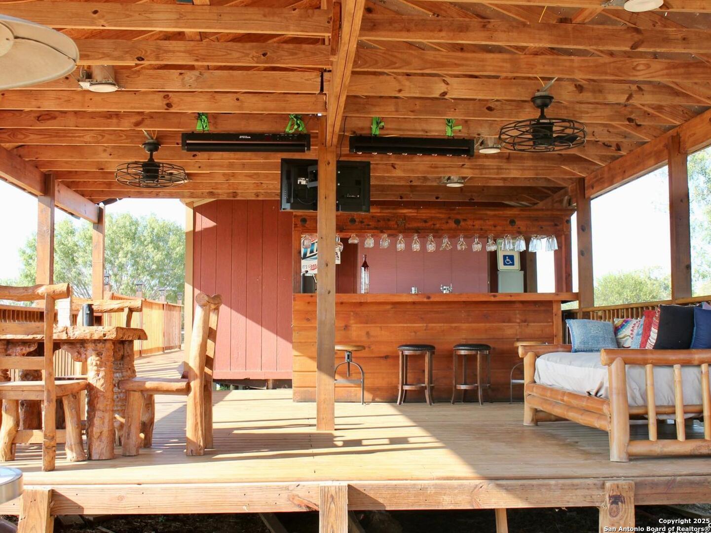 13014 Bernhardt Road San Antonio, TX 78263 - Photo 25 of 29 a view of couches with a patio