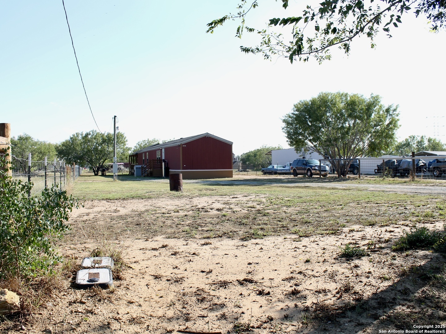 13014 Bernhardt Road San Antonio, TX 78263 - Photo 7 of 29 a view of a yard with an empty space