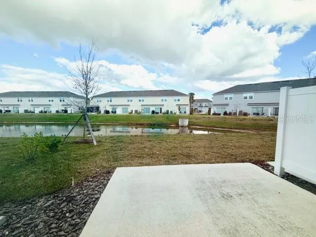 a view of a city street with a building and a street