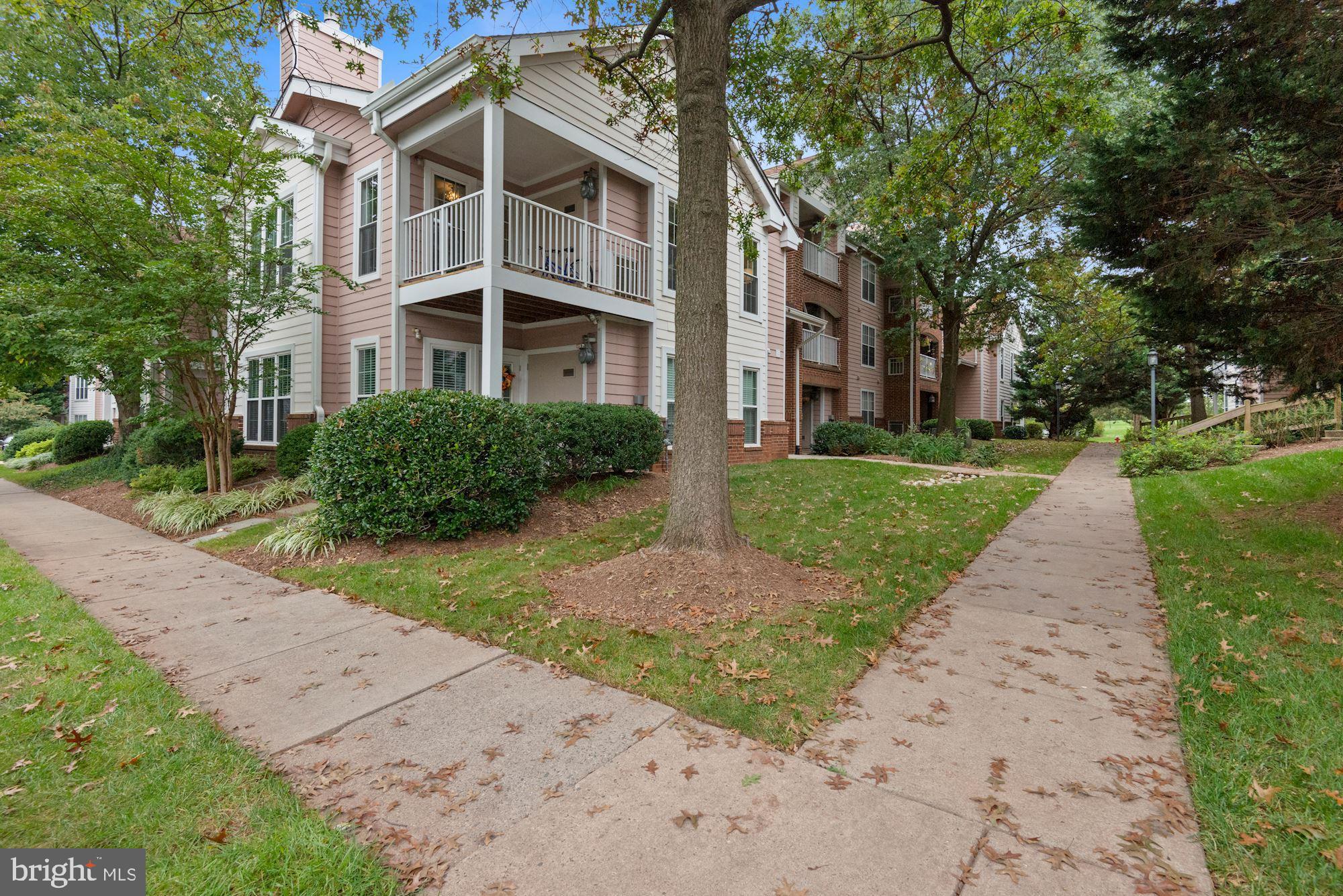 21013 Timber Ridge Terrace, Unit 204 Ashburn, VA 20147 - Photo 3 of 49 Side Exterior