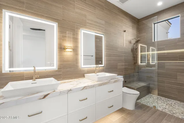 a very nice looking rest room with a large window