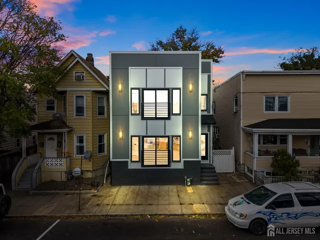 a front view of a house with swimming pool