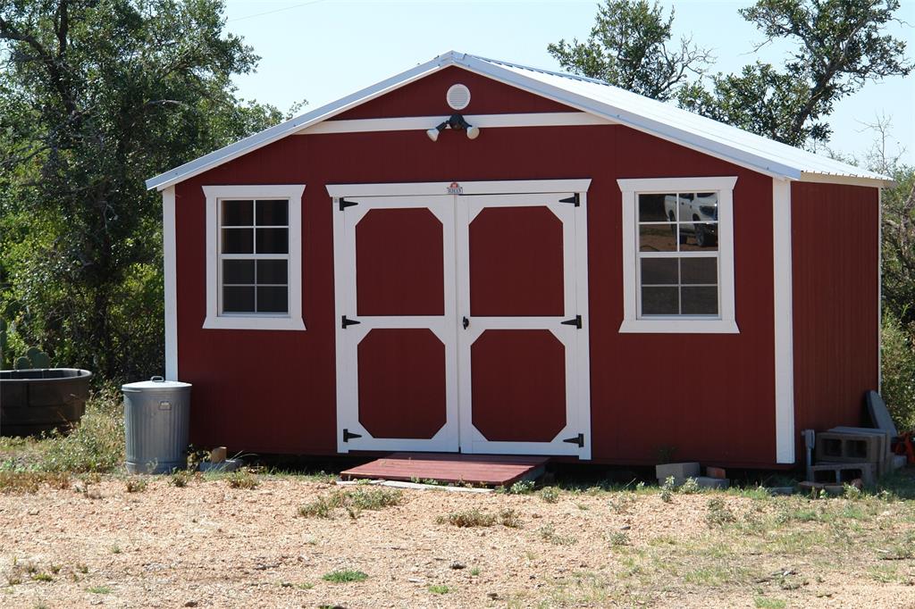 0 County Road 152 Brady, TX 76825 - Photo 5 of 17 a front view of a house with a yard