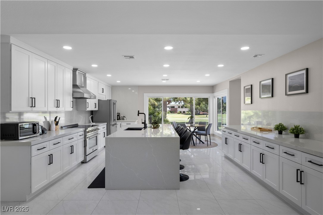 3482 Pueblo Way Las Vegas, NV 89169 - Photo 14 of 55 Generous counterspace and abundant cabinetry make this kitchen a practical and stylish space for everyday use!