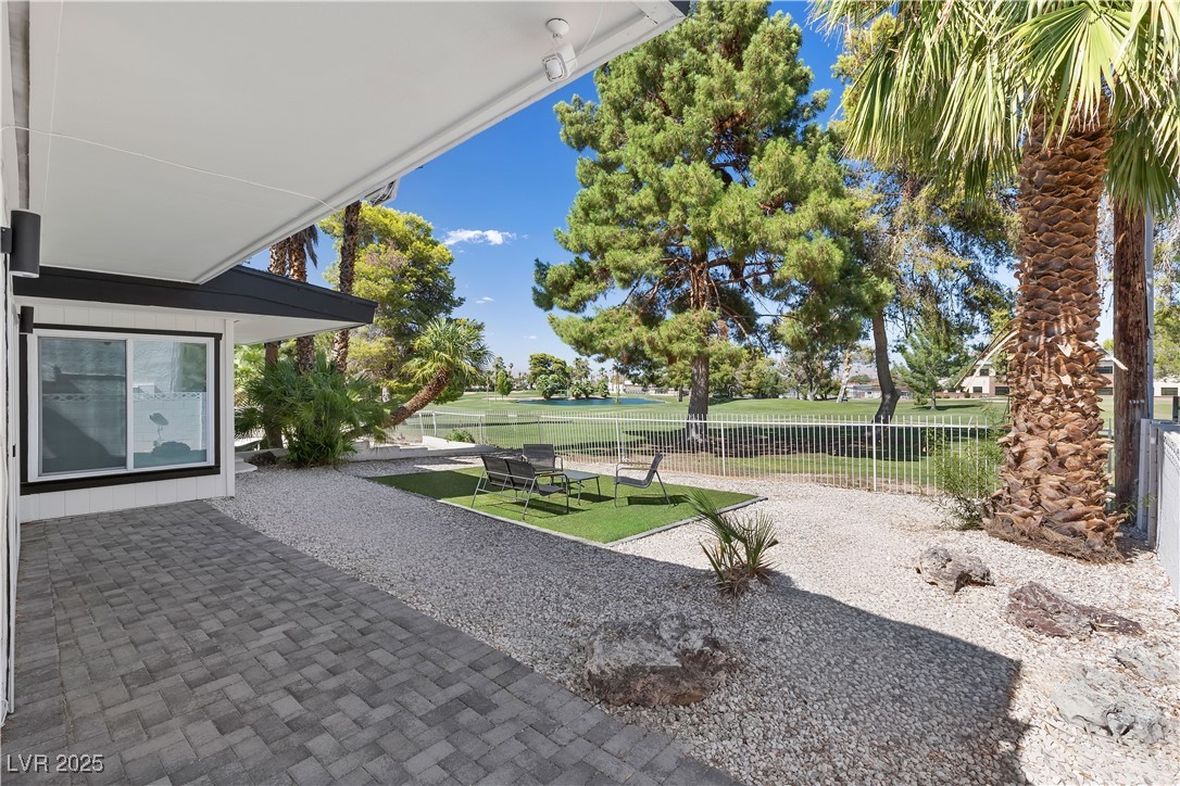 3482 Pueblo Way Las Vegas, NV 89169 - Photo 39 of 55 Expansive backyard with a sparkling pool ready for summer fun.