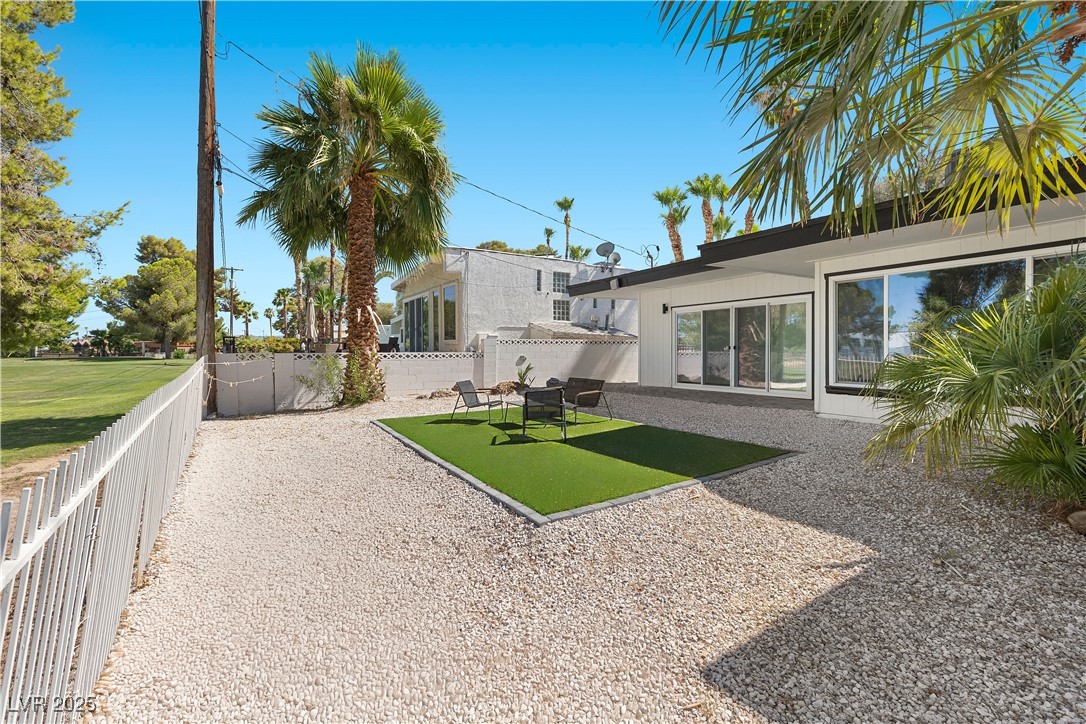 3482 Pueblo Way Las Vegas, NV 89169 - Photo 40 of 55 Live on the edge of the green—fence opens straight onto the course!