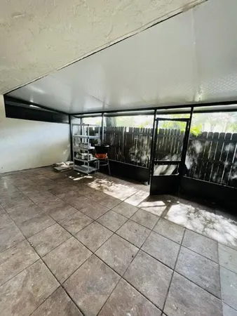 a close view of a sink and dishwasher in kitchen