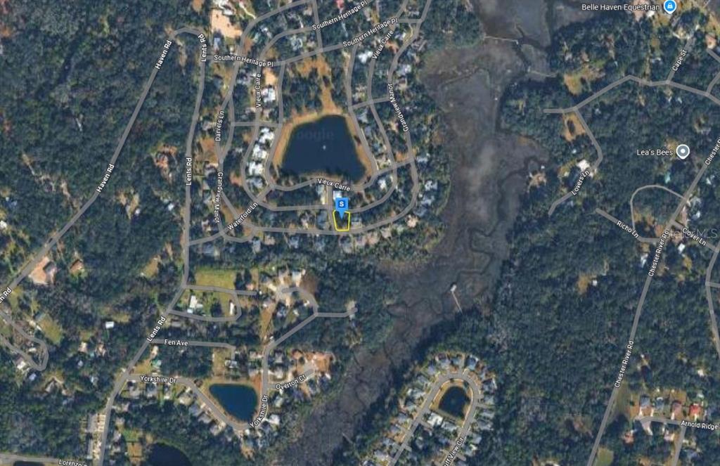 29201 Grandview Manor Yulee, FL 32097 - Photo 2 of 5 a picture of a tree in a backyard