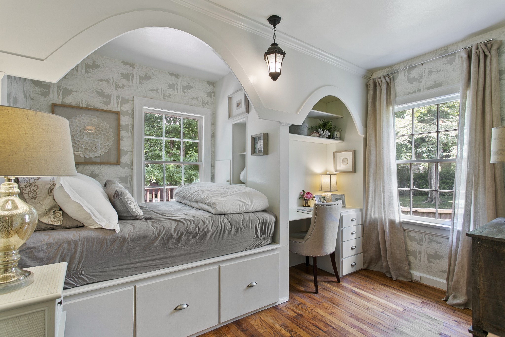 130 Spring Valley Road Nashville, TN 37214 - Photo 19 of 46 a bedroom with a bed and wooden floor