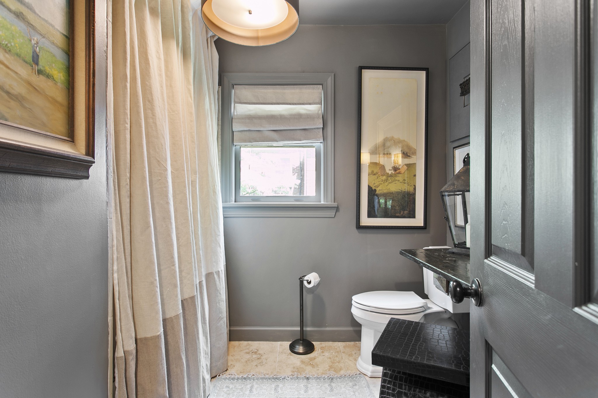 130 Spring Valley Road Nashville, TN 37214 - Photo 22 of 46 a bathroom with a toilet a sink and mirror